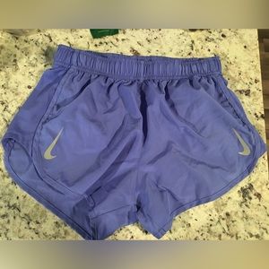 Small NIKE Dri Fit Periwinkle Blue Running Shorts with a liner.